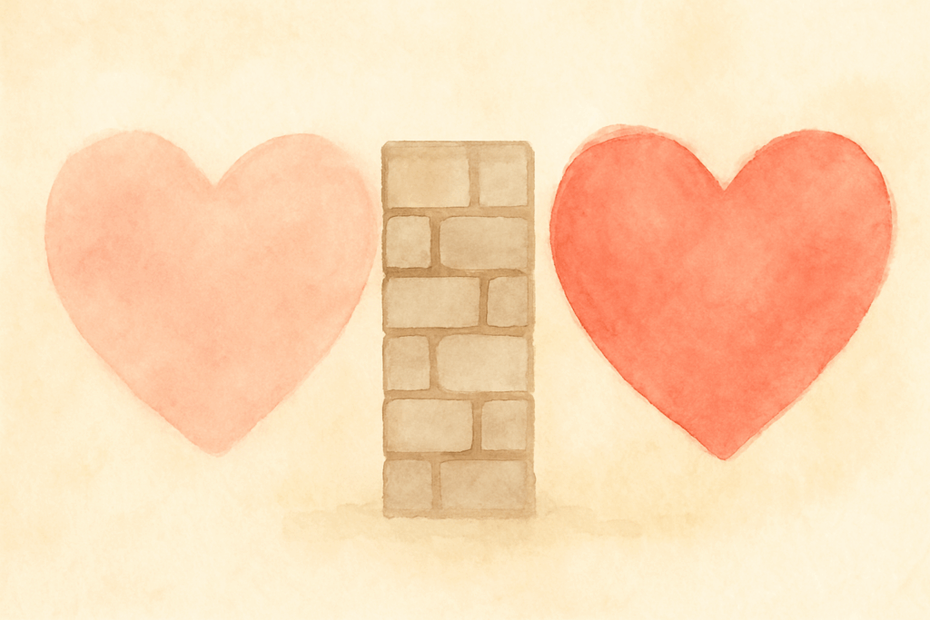 2つのハートの間に、少し高めの柵や壁が描かれている